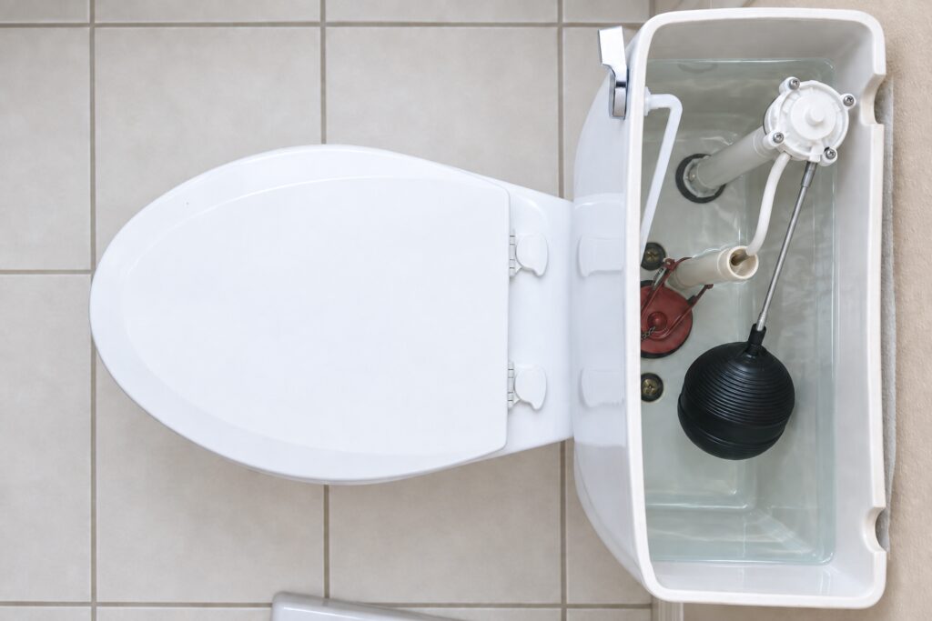 Running toilet being repaired.